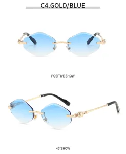 Rimless polygonal gradient blue sunglasses with luxury gold metal frame and stylish temples.