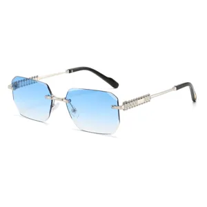 Men's fashion polygon rimless sunglasses with blue gradient lenses and ornate metal temples.