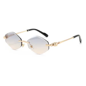 Luxury frameless polygon sunglasses for women, gradient lenses and gold metal temples.