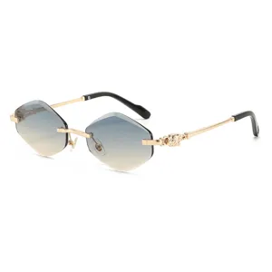 Rimless polygonal gradient sunglasses with gold metal temples for fashion driving daily wear.