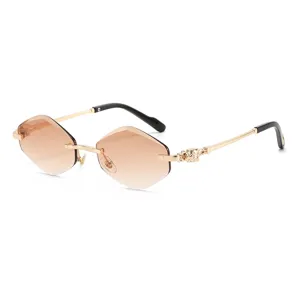 Fashion polygonal rimless sunglasses for women and men, gradient brown lenses with gold metal frames.