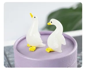 Cute glass duck figurine desktop decoration, small white animal ornament for home living room.