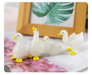 Cute white glass duck figurines set, creative desktop animal ornaments for home decor.