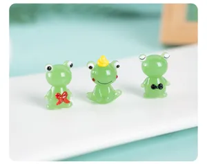 Cute glass frog miniature figurine detail, creative handmade desktop car ornament decor.