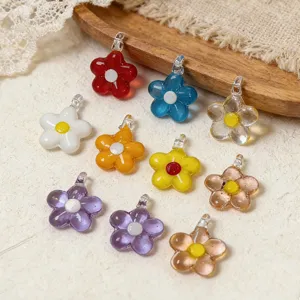 Vibrant colorful glass flower pendants mini five-petal charms for DIY jewelry making.