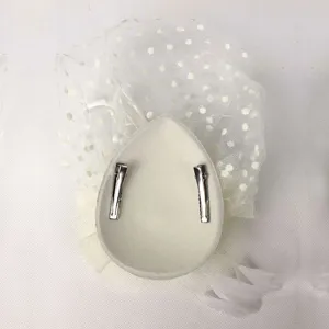 White bridal mesh hair clip fascinator with polka dot tulle and feather back view detail.