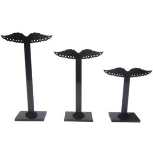 Set de 3 soportes de exhibición de aretes de acrílico negro con diseño de alas.