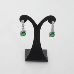 Elegant green gemstone drop earrings with sparkling cubic zirconia halo details.