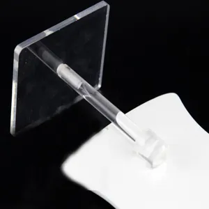 Clear acrylic necklace display stand detail, jewelry showcase prop accessory stand for retail.