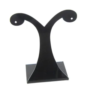 Black acrylic earring display stand close up detail holder ear studs prop organization showcase