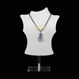 Necklace display stand with blue gemstone pendant showcasing elegance and modern design.