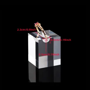 Clear acrylic ring display stand detail showing precise dimensions and slot design for jewelry.