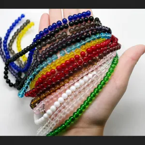 Detailed view of colorful glass round beads, multi-specification DIY jewelry making accessories.