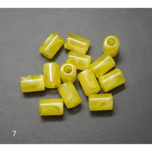 Yellow imitation amber acrylic barrel beads detail shot for DIY handmade jewelry accessories