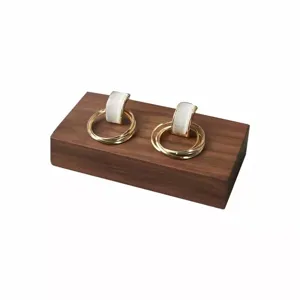 Walnut wood jewelry display block for photography props and stylish ring showcase