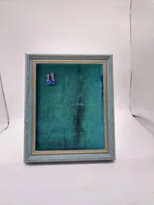 Vintage dark green velvet jewelry display frame for earrings, elegant photo frame stand organizer.