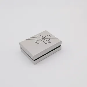 Silver jewelry gift box with black bow design, perfect for necklace ring packaging display.