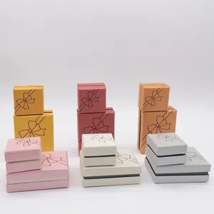 Detailed view of colorful paper jewelry gift boxes, perfect for rings and necklaces.