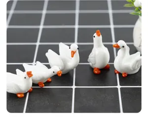 Cute mini glass white goose figurines, creative handmade desktop landscape ornament photography props.