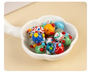 Multicolor glass face beads for DIY handmade jewelry bracelets and necklaces crafting.