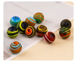 Detailed close-up shot of colorful frosted glass swirl beads, perfect for DIY jewelry making accessories.