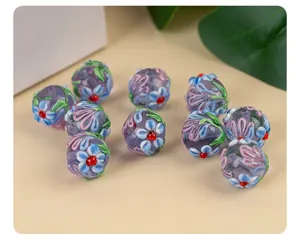 Handmade lampwork glass beads featuring beautiful 3d five-petal flowers for diy jewelry crafting.