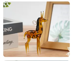 Handcrafted amber glass animal figurine desktop ornament with cute design and detail view.