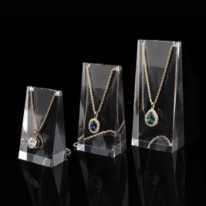 Clear acrylic necklace display stand set for jewelry store counter showcase presentation.