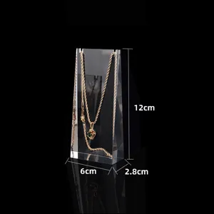 Transparent acrylic necklace display stand jewelry showcase rack for retail stores and home use.