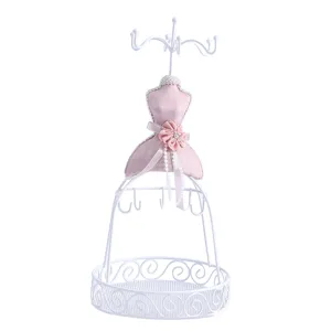 Detailed view of the white metal and pink fabric mannequin jewelry display stand with multiple hooks.
