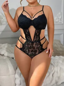 Plus size black lace underwire teddy lingerie with strappy cutout design for women sexy wear.