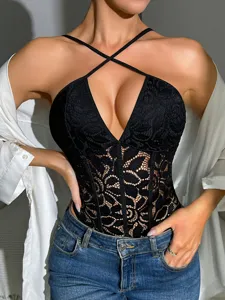 Sexy black lace halter bodysuit detail shot, featuring a deep V-neck and hollow-out design.