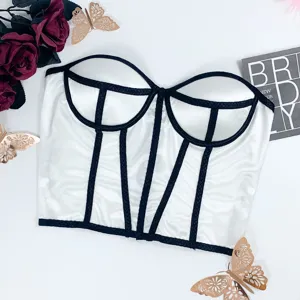 White strapless corset bustier top with black contrast boning and underwire support.