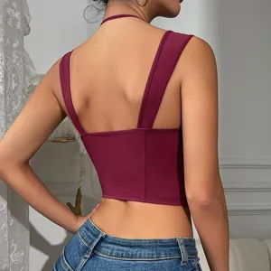 Burgundy corset crop top, sleeveless backless design with boning for a slim fit style.