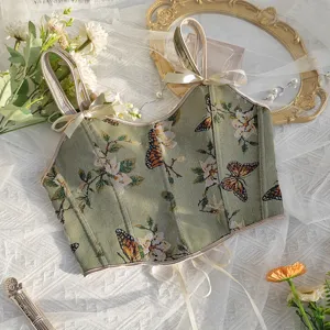 Top corsé floral vintage francés con tirantes de lazo y jacquard de mariposa elegante.