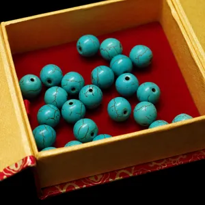 Synthetic turquoise round loose beads for DIY jewelry making and bracelet accessories.