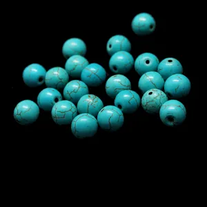 Synthetic turquoise round beads loose beads for jewelry making and crafting DIY projects.