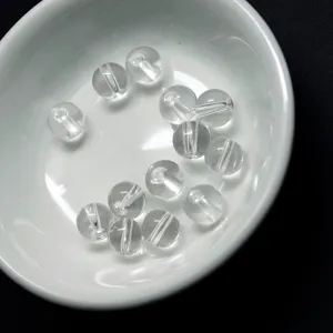 Clear acrylic round beads, perfect for DIY jewelry making, bracelets, and crafts.
