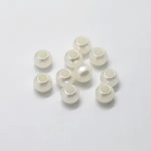 Details of off-white imitation pearl large hole loose beads for DIY jewelry making accessories.