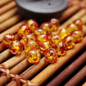 DIY perles rondes en résine ambre synthétique bracelet fabrication de bijoux en gros.