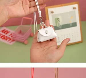Mini PU lederen oortelefoon etui ketting hanger detail, kleine witte portemonnee met koord.