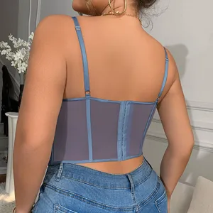Detailed back view of a stylish blue corset top showcasing thin straps and hook closure.