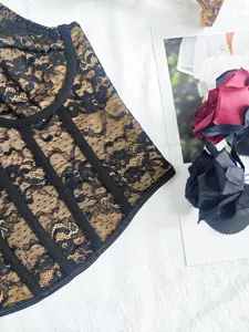 Black lace corset top detail, floral and bone structured bustier design for women.