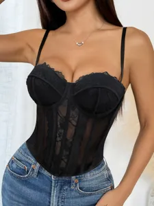 Black lace mesh bustier detail close-up, stylish strap corset top for women fashion.