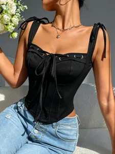 Women black corset camisole top with bow tie straps, square neck, front lace-up detail.