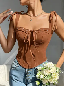 Sexy brown corset top for women, featuring chic bow tie, lace-up detail and stylish straps.