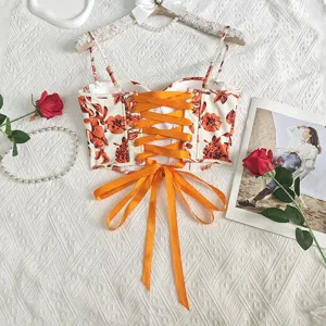Vintage floral print corset top with striking orange ribbon lace-up back design for women.