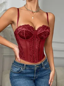 Close-up of women red lace bustier corset top, sexy sweetheart neckline with slim straps.