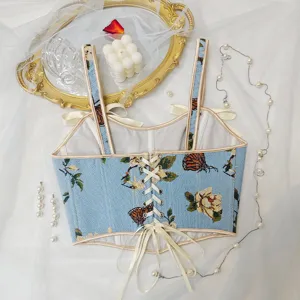 Top corsé floral vintage francés con cordones en la espalda y elegantes detalles de lazos.