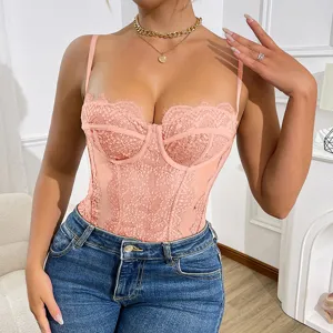 Pink lace cutout bodysuit detail view, paired with casual denim jeans and gold jewelry.